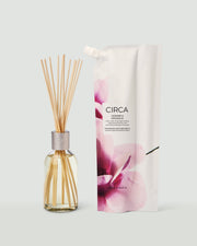 Jasmine & Magnolia fragrance diffuser with reeds and matching refill pouch.