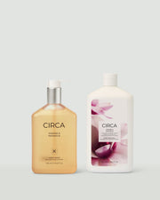 Jasmine & Magnolia Hand Wash and matching refill bottle on a pale background.