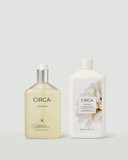 Oceanique Hand Wash and matching refill bottle on a pale background.