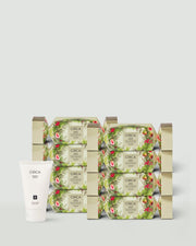 Eight Mango & Papaya Hand Cream Bonbon gift boxes with a hand cream tube.