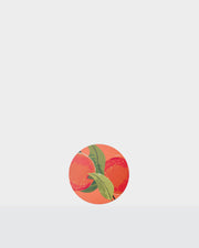 Round Summer paper coasters with a colourful fruit and green leaf print.