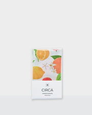 Summer paper dinner napkins with a colourful citrus, green leaf and floral print.
