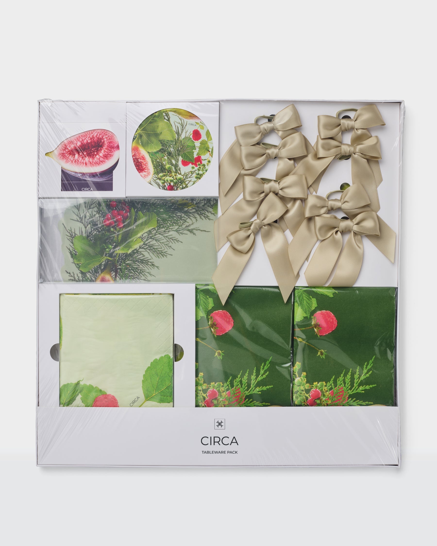 Festive Tableware Pack with green botanical paper tableware and cream bow napkin rings.