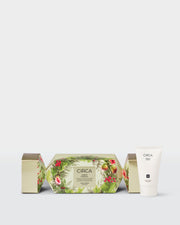 Mango & Papaya 40ml Hand Cream beside front-facing botanical Christmas bonbon packaging.